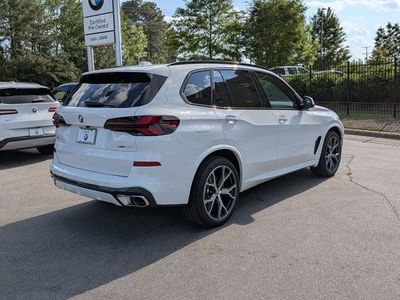 2026 BMW X5 — rear three-quarter view