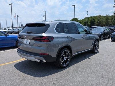 2026 BMW X5 — rear three-quarter view