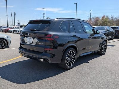 2026 BMW X5 — rear three-quarter view