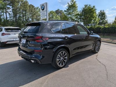 2026 BMW X5 — rear three-quarter view