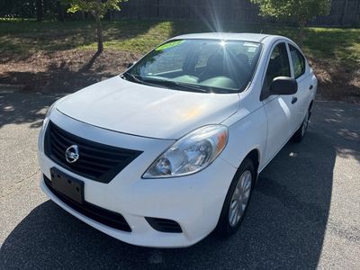 2014 Nissan Versa — rear three-quarter view
