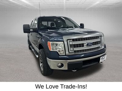 2014 Ford F-150 — rear three-quarter view