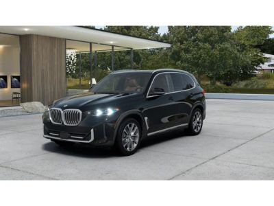 2026 BMW X5 xDrive50e in Black Sapphire Metallic — front three-quarter view