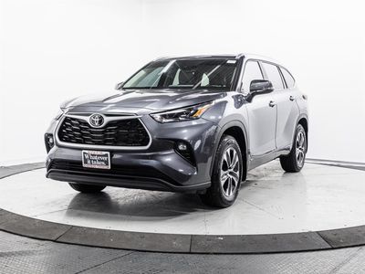 2025 Toyota Highlander Hybrid — rear three-quarter view