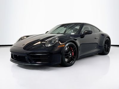 2023 Porsche 911 Carrera GTS in Jet Black Metallic — front three-quarter view