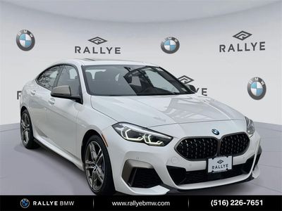 2024 BMW 2 Series M235i xDrive in Alpine White — front three-quarter view