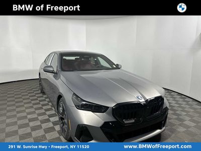 2026 BMW i5 xDrive40 in Oxide Grey Metallic — front three-quarter view