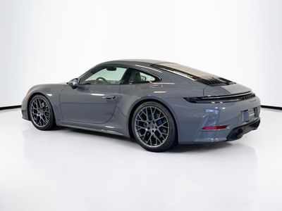 2025 Porsche 911 — rear three-quarter view