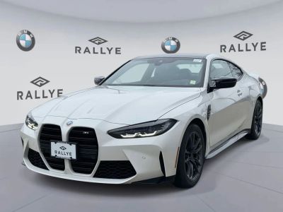 2023 BMW M4 — rear three-quarter view