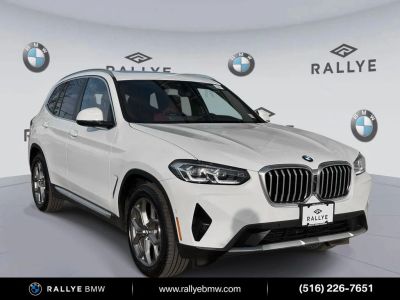 2023 BMW X3 xDrive30i in Alpine White — front three-quarter view