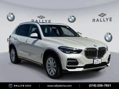 2023 BMW X5 xDrive40i in White Metallic — front three-quarter view