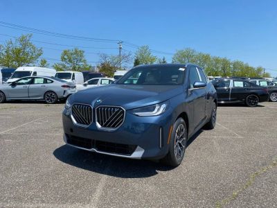2026 BMW X3 30 xDrive in Arctic Race Blue metallic — front three-quarter view