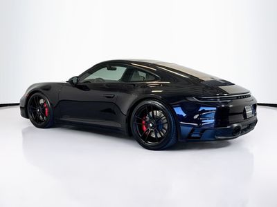 2023 Porsche 911 — rear three-quarter view
