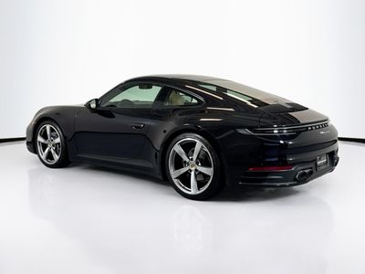 2024 Porsche 911 — rear three-quarter view