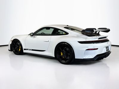 2026 Porsche 911 — rear three-quarter view