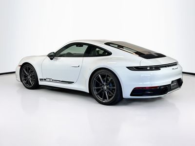 2024 Porsche 911 — rear three-quarter view