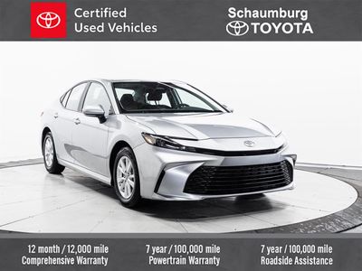 2025 Toyota Camry LE in Silver — front three-quarter view