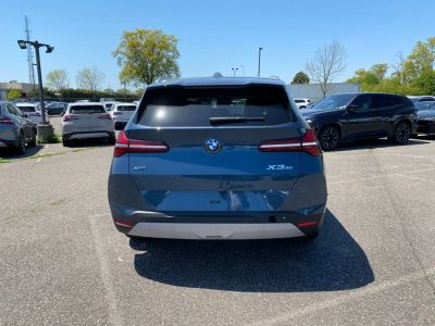 2026 BMW X3 — rear three-quarter view