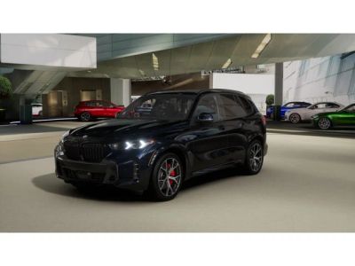 2026 BMW X5 xDrive40i in Carbon Black Metallic — front three-quarter view
