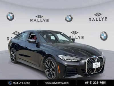 2023 BMW 4 Series 430i in Black Sapphire Metallic — front three-quarter view