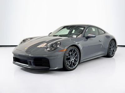 2025 Porsche 911 Carrera T in Slate Grey Neo — front three-quarter view