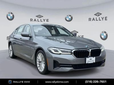 2023 BMW 5 Series 530i xDrive in Gray Metallic — front three-quarter view