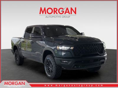 2026 Ram 1500 Rebel in Forged Blue Metallic — front three-quarter view