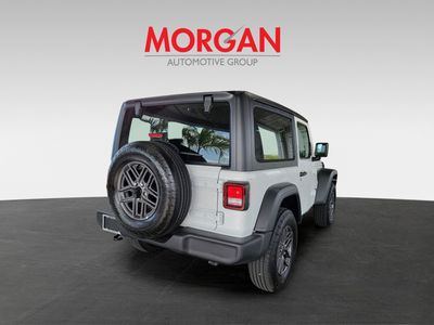 2026 Jeep Wrangler — rear three-quarter view
