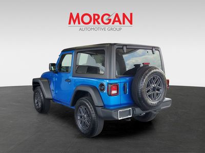 2026 Jeep Wrangler — rear three-quarter view