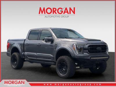 2023 Ford F-150 Lariat in Gray — front three-quarter view