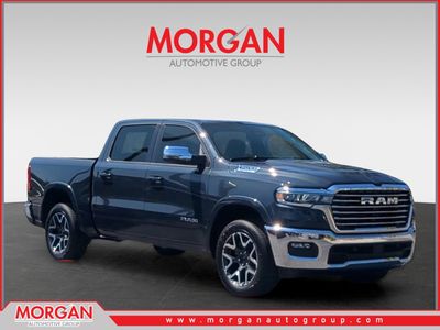 2026 Ram 1500 Laramie in Blue — front three-quarter view