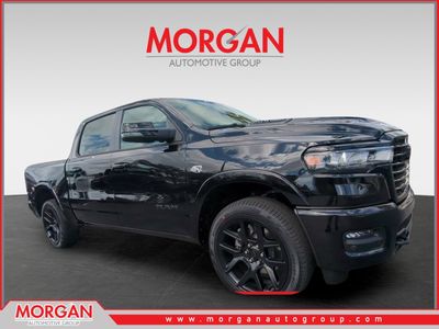 2026 Ram 1500 Laramie in Black — front three-quarter view