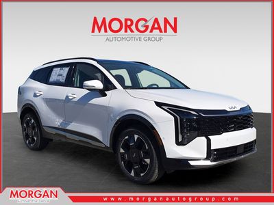 2026 Kia Sportage SX-Prestige in Glacial White Pearl — front three-quarter view