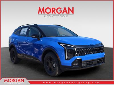 2026 Kia Sportage X-Pro Prestige in Nebular Blue/Black Roof — front three-quarter view