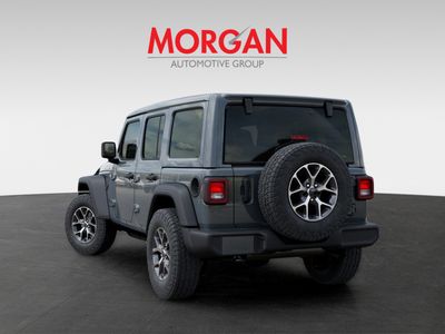 2026 Jeep Wrangler — rear three-quarter view