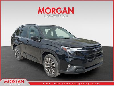 2026 Subaru Forester Touring in Crystal Black Silica — front three-quarter view