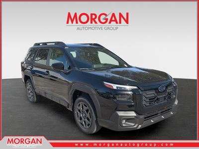 2026 Subaru Outback Premium in Crystal Black Silica — front three-quarter view