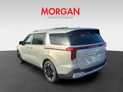 2026 Kia Carnival — rear three-quarter view