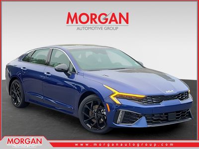 2026 Kia K5 GT-Line in Blue — front three-quarter view