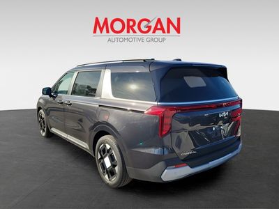 2026 Kia Carnival — rear three-quarter view