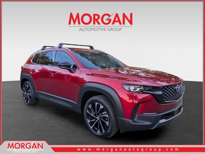 2026 Mazda CX-50 Hybrid Premium Plus in Red — front three-quarter view