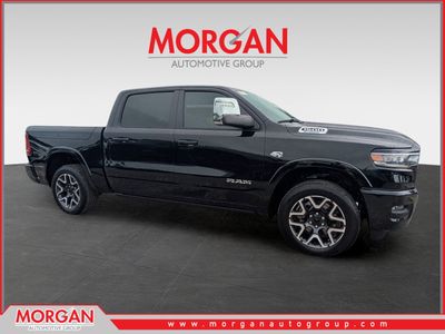 2026 Ram 1500 Laramie in Black — front three-quarter view