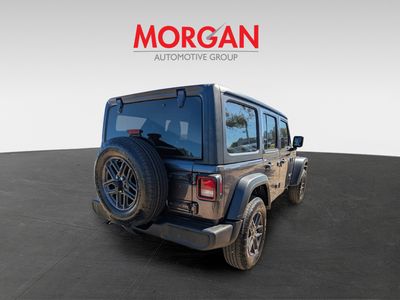 2026 Jeep Wrangler — rear three-quarter view