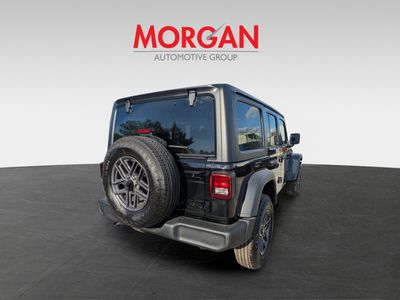2026 Jeep Wrangler — rear three-quarter view