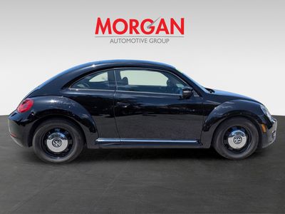 2015 Volkswagen Beetle Coupe — rear three-quarter view