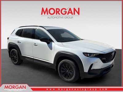 2026 Mazda CX-50 Hybrid Premium in Wind Chill Pearl — front three-quarter view