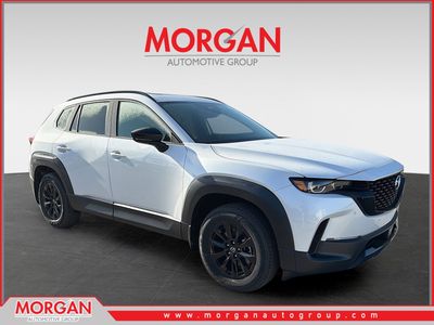 2026 Mazda CX-50 Hybrid Premium in Wind Chill Pearl — front three-quarter view