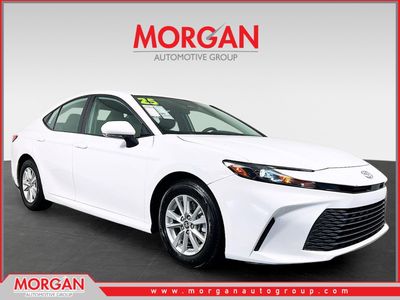 2025 Toyota Camry LE in White — front three-quarter view