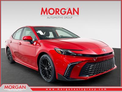 2026 Toyota Camry SE in Red — front three-quarter view