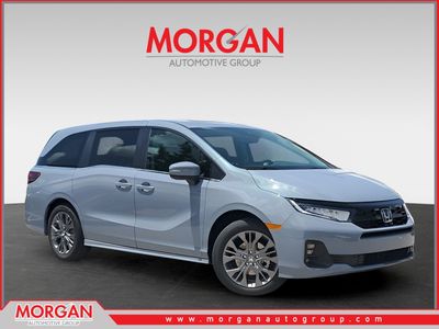 2026 Honda Odyssey Touring in Sonic Gray Pearl — front three-quarter view